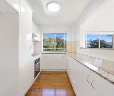 Warm and inviting top floor apartment sure to make you feel right a... - Photo 6