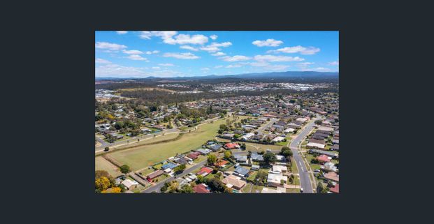 Charming 3-Bedroom Home with Rumpus Room and Spacious Yard - Photo 1