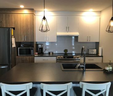 5 1/2 condo locatif - rez de chaussée - Photo 2