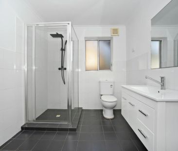 Tastefully Renovated Ground Floor Unit in Quiet Complex - Photo 6