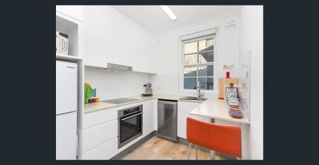 SITUATED AT THE REAR OF BUILDING - RENOVATED BEACHSIDE ABODE - Photo 2