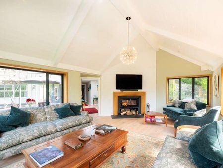 A substantial and beautifully presented four bedroom house, set in an elevated position with valley views. Driveway, large garage workshop with a lift to the li - Photo 5