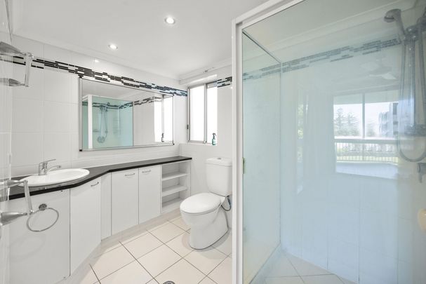 Just a Few Steps from the Sand: Perfect Beachside Living! - Photo 1