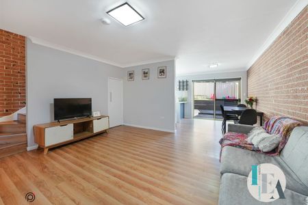Immaculate Two-Bedroom Townhouse in Prime but Peaceful Location - Photo 4
