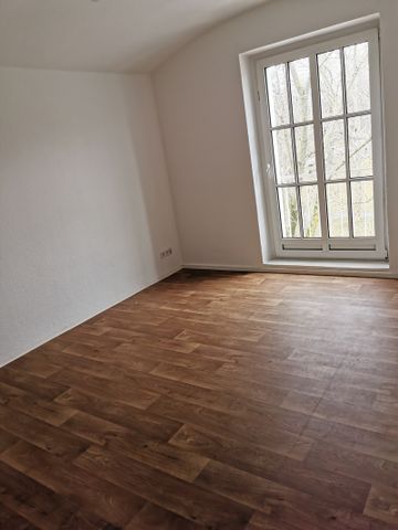 Hübsche Familienwohnung mit 2 Bädern und Balkon - Foto 3