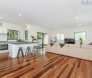 Great family home with air conditioned living space and large bedro... - Photo 1