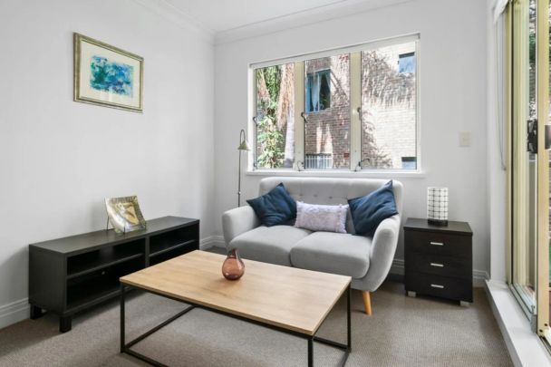 Tranquil Studio Apartment with Balcony in Village Setting + Parking - Photo 1