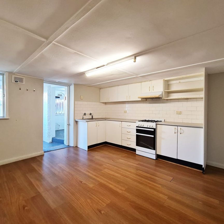 DOUBLE-FRONTED COLONIAL-STYLE TWO-LEVEL HOME - Photo 1