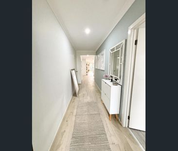 Contemporary 4-Bedroom Home in a Great Location - Photo 5