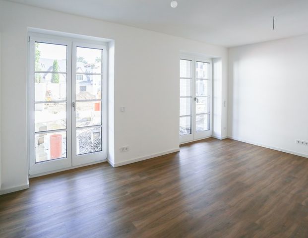 Zwei Terrassen, drei Zimmer, viel Komfort - Familienfreundliche Wohnung mit Gartenbezug im EG - Foto 1