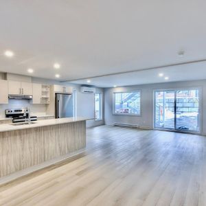 CONDO 5 1\2 FLAMBANT NEUF + 5 ÉLECTRO INCLUS + GRAND BALCON + STATIONNEMENT - Photo 2