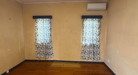 Comfortable 4-Bedroom Home in a Handy Location - Photo 5