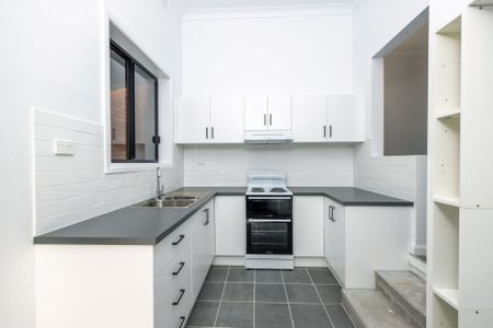 Renovated Three-Bedroom Unit in Commercial Precinct - Photo 4