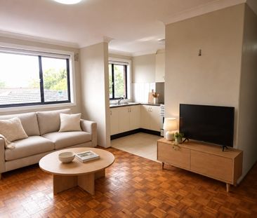 Light-Filled Top Floor Apartment – Walk to Belmore Station & Shops! - Photo 1