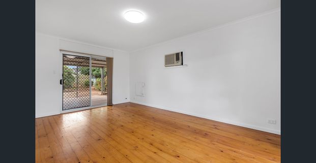 Family Comfort in a Convenient Location! - Photo 1