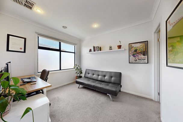 "Modern Two-Bedroom Townhouse with Low Maintenance Living and Prime Location" - Photo 1