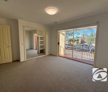 PERFECTLY LOCATED TOWNHOUSE WITH 2 FAMILY AREAS - Photo 1