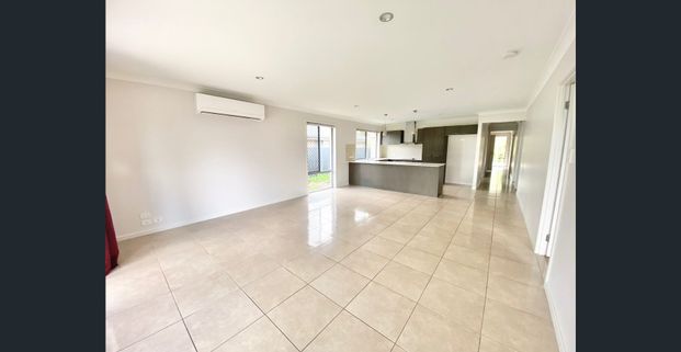 Family-Friendly 4 Bedroom Home with Side Access! - Photo 1