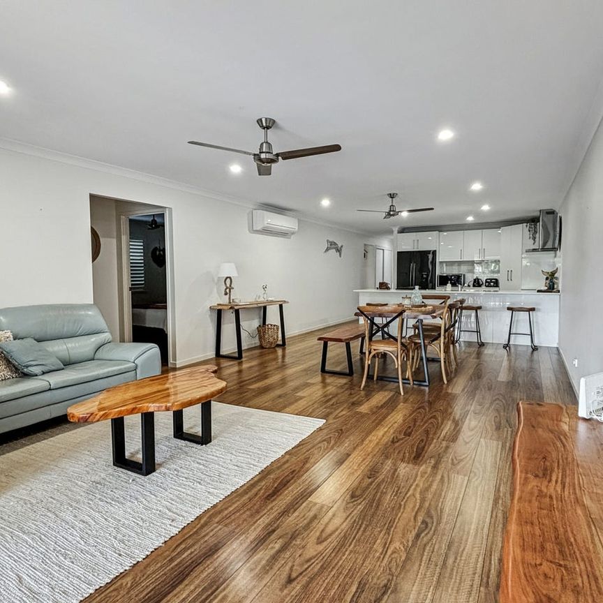 Bright, Spacious & Steps from the Water – Coastal Living at Its Best - Photo 1