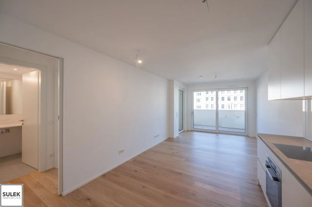Entzückende 2 Zimmer Neubauwohnung mit Balkon & Wienfluss-Blick im 6. Stock - ab Mai 2026! - Photo 1