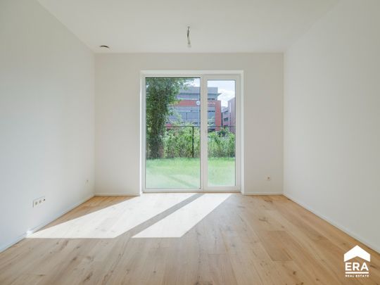 Gelijkvloers nieuwbouwappartement met tuin bij Genk centrum - Photo 1