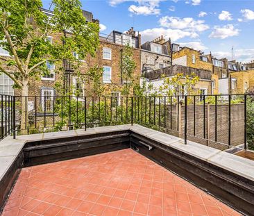 A beautifully refurbished five bedroom house, with separate terrace, tucked away in a pretty street seconds from the shops, bars and restaurants of the Kings Road - Photo 1