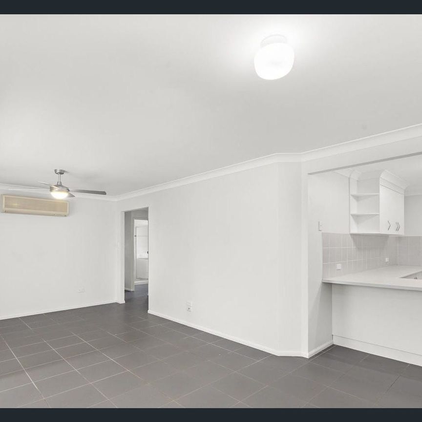 SPACIOUS MODERN HOME IN POPULAR BIRKDALE LOCATION - Photo 1