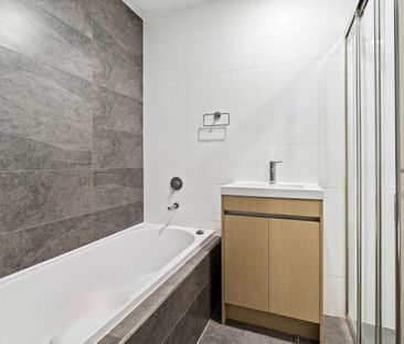 Modern Three Bedroom Living in an Unbeatable Location! - Photo 1