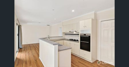 Spacious 4-Bedroom Family Home with Multiple Living Zones - Photo 2