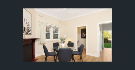 Unfurnished floorboard throughout living room and bedrooms | Laundry room with toilet | Study area - Photo 5