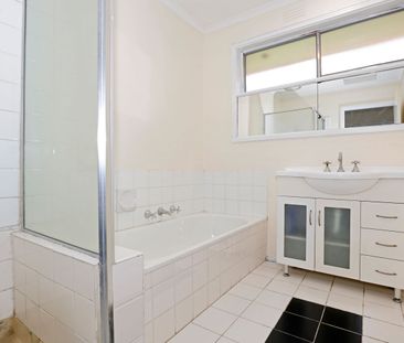 Spacious 3-Bedroom Home with Natural Light and Modern Amenities - Photo 1