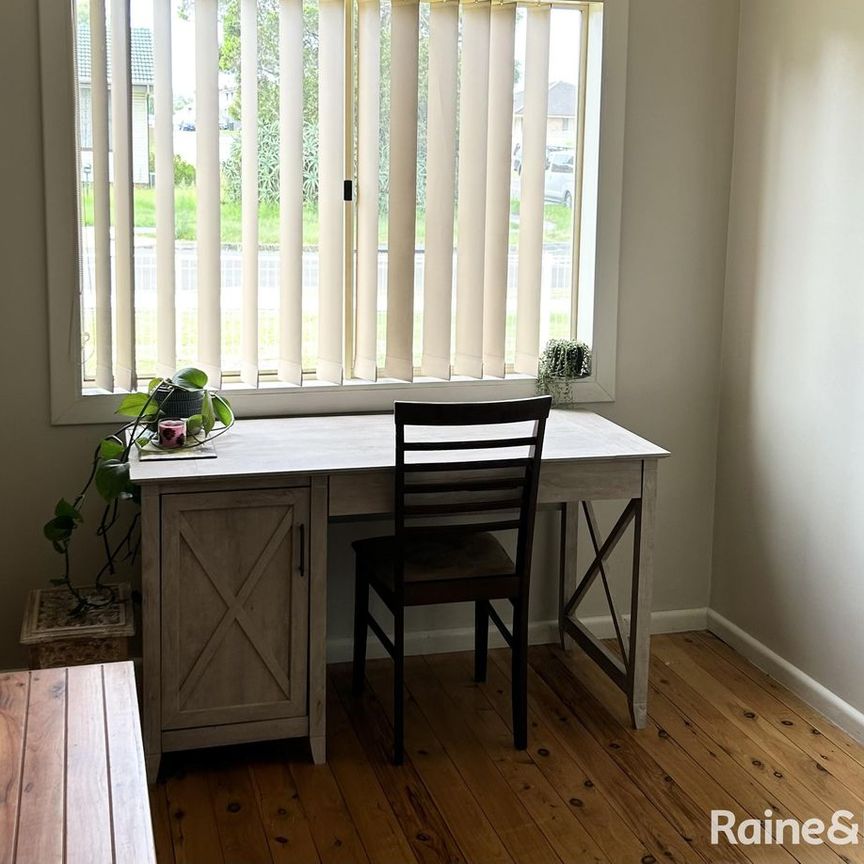 Charming Three-Bedroom Home! - Photo 1