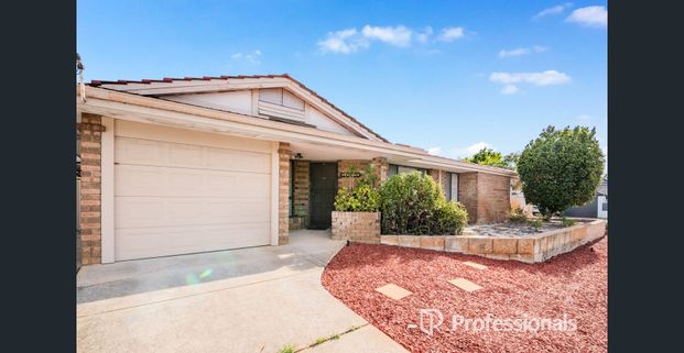 Spacious 4-Bedroom Family Home with Multiple Living Areas - Photo 1