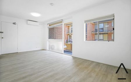 Renovated, Spacious and Sun-Drenched One Bedroom Apartment , Conveniently Located - Photo 2