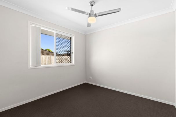 Spacious Family Retreat with Dual Living Areas & Modern Comforts in Prime Location - Photo 1