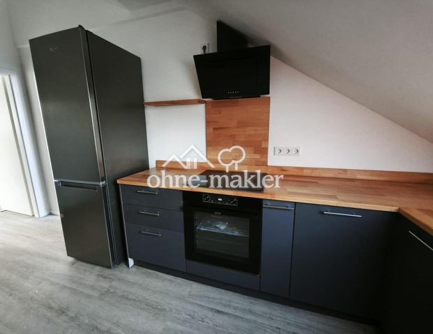 Erstbezug: Wunderschöne Dachgeschosswohnung in bester Lage - Photo 1