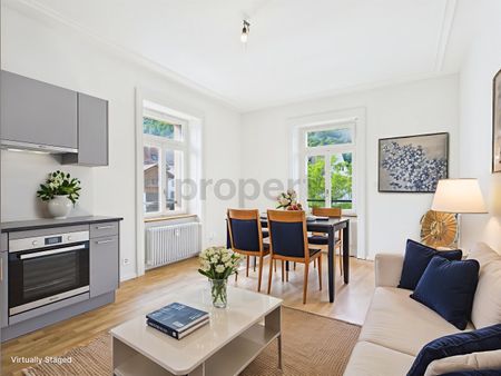 Charmante 3.5-Zimmer-Wohnung in denkmalgeschütztem Gebäude in Büsserach - Photo 2