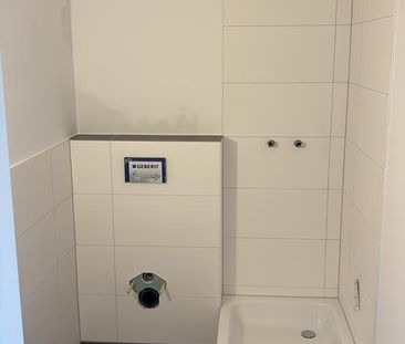 Sanierte 2,5 Zimmer Wohnung in ruhigem Mehrfamilienhaus - Foto 1