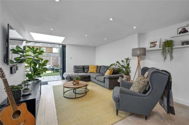 A beautifully presented three bedroom end of terrace property. Set in an idyllic location opposite woodlands and situated 0.4 of a mile to Weybridge train station and the high street. - Photo 1