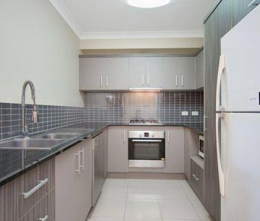 Stylish and Centrally Located Furnished Apartment at Cairns One Resort - Photo 6