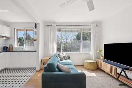 Leafy Top-Floor Haven with Dual Balconies and Modern Comfort - Photo 3