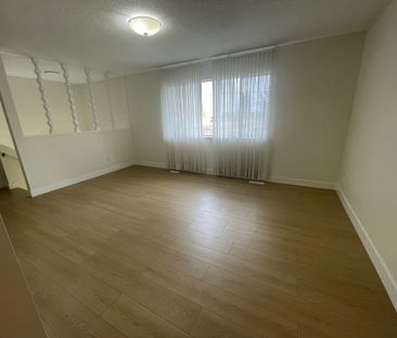 Beautifully Renovated Two-Level Home - Photo 5