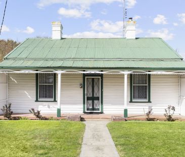Charming Cottage in the Heart of Woodend - Photo 6