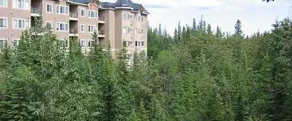Quiet two bedroom top floor suite in the Wedgewood's, Discovery Ridge, Calgary — 2 Bedrooms Condo Unit - Photo 1