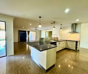 MODERN 4-BED, 2-BATH FAMILY HOME WITH EXPANSIVE ENTERTAINMENT AREA ... - Photo 5