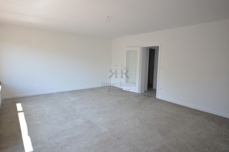 Sehr schönes Apartment mit Balkon und einem modernen Badezimmer! - Photo 2