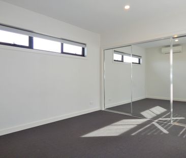 Modern Spacious and Close to a Host of Amenities! - Photo 5