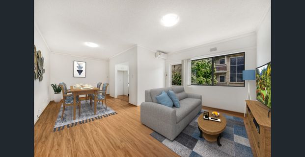 Centrally Located Two Bedroom Unit with Air Conditioning in a Parkside Location! - Photo 1