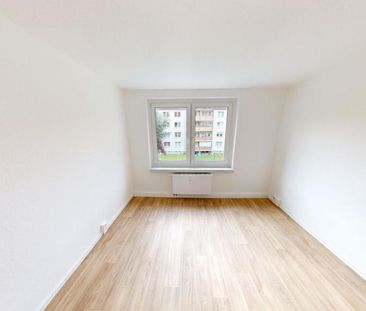 Mit Blick ins Grüne gelegene 3-Raum-Wohnung mit Balkon - Foto 2