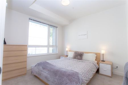 Spacious One Bedroom Corner Unit by New Skytrain Station - Photo 3